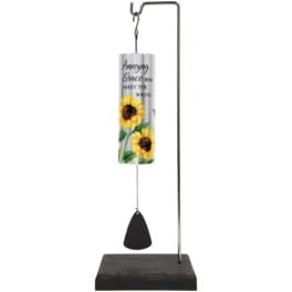 Sunflower-themed wind chime hanging from a metal stand with a wooden base.