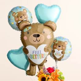 Bear-shaped balloons with a small mixed flower bouquet