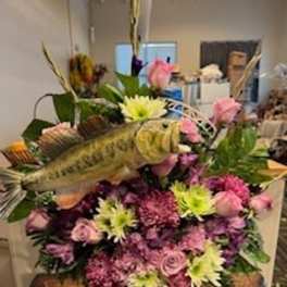 Fish-shaped floral arrangement with pink and green flowers