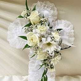 White floral cross with lace ribbon and roses