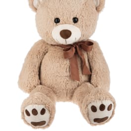 Large tan teddy bear with brown bow sitting upright facing forward