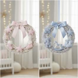 Pink and blue nursery wreaths with bows and baby-themed ornaments