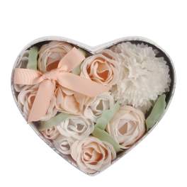 Heart-shaped box of pale pink and white artificial flowers with a ribbon bow
