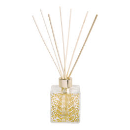 Square glass reed diffuser bottle with gold pattern and reeds