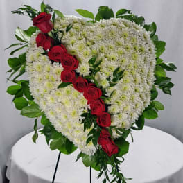 Heart-shaped white chrysanthemum arrangement with red roses