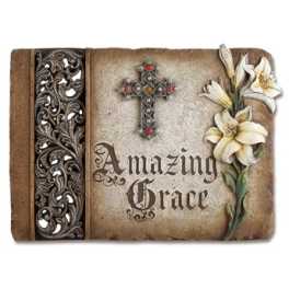 Decorative book cover with a cross and white lilies