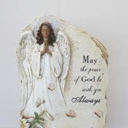 Decorative angel figurine with a peace message