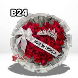 Red rose bouquet with a silver crown and white ribbon