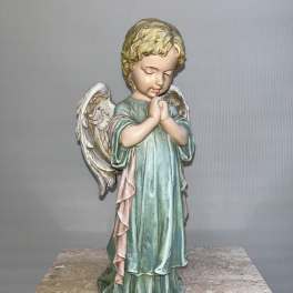 Praying angel figurine with pastel robe and white wings