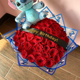 Red rose bouquet with a Stitch plush and birthday ribbon