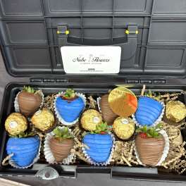 Gift box with chocolate-covered strawberries and Ferrero Rocher candies