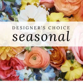 Designer’s choice seasonal bouquet with mixed colorful flowers