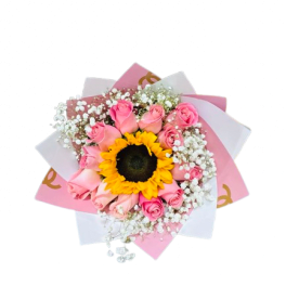 Round bouquet with a central yellow sunflower surrounded by pink roses and white filler flowers in pink and white wrap