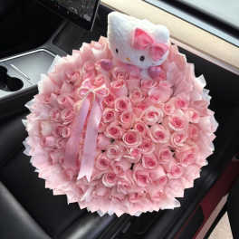 Large pink rose bouquet with a Hello Kitty plush topper