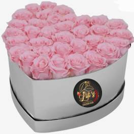 Heart-shaped box filled with pink roses