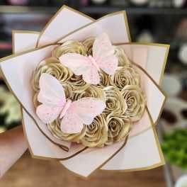 Bouquet of gold satin roses with pink butterfly decorations