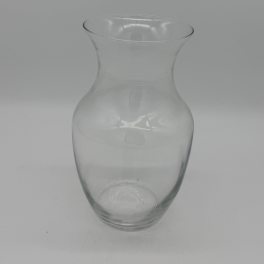 Clear glass vase with a flared rim and narrow neck
