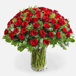 Bouquet of red roses in a clear glass vase
