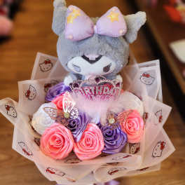 Plush Hello Kitty bouquet with pink and purple roses and a birthday topper
