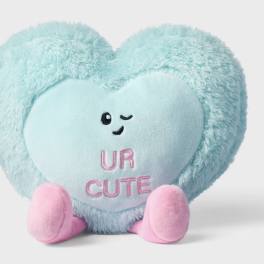 Heart-shaped plush pillow with "UR CUTE" embroidery