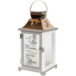 Decorative white lantern with a copper top and memorial text