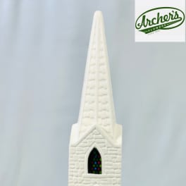 White church figurine with a tall steeple and stained-glass windows