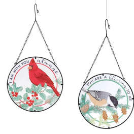 Two round hanging bird-themed wall signs with seasonal text