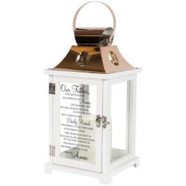 White decorative lantern with a copper top and printed prayer text