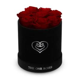 Red roses arranged in a black round box