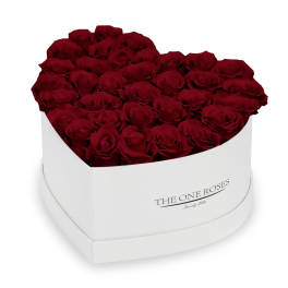 Heart-shaped box filled with red roses