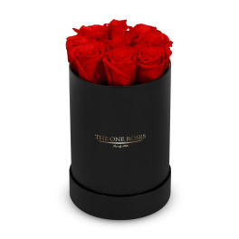 Red roses in a black round box