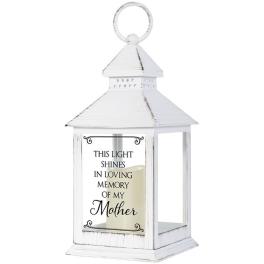 White memorial lantern with a candle and "In loving memory of my Mother" text