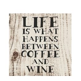 Wooden sign with the words "Life is what happens between coffee and wine"