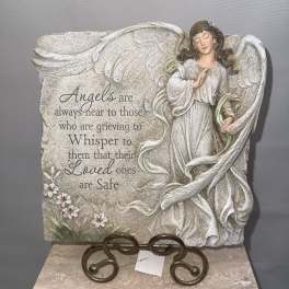 Angel memorial plaque with grieving quote and floral accents