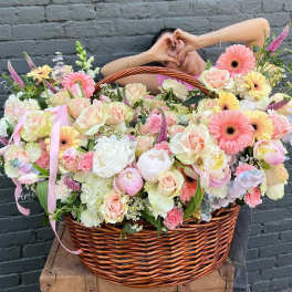 Large pastel flower basket with pink and white blooms