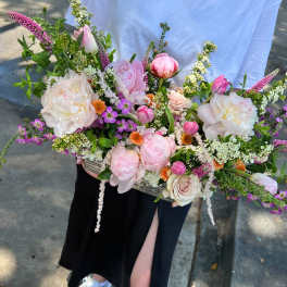 Large pastel bouquet with pink and white flowers in a rectangular container