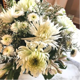 Creamy white chrysanthemum bouquet with small filler flowers