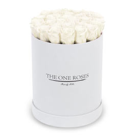 White roses arranged in a round white box