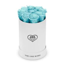 Blue roses in a white cylindrical box