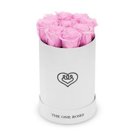 Pink roses arranged in a white cylindrical box