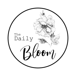 Circular logo with a line-drawn flower and the words "The Daily Bloom"