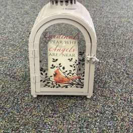 White lantern with a cardinal and the words "Cardinals appear when angels are near"