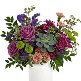 Mixed bouquet with purple roses and a succulent in a white vase