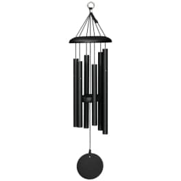 Black metal wind chime with hanging tubes and a round striker