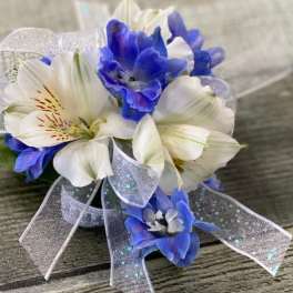 Blue and white corsage