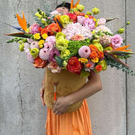 Large colorful bouquet with roses, hydrangeas, and bird of paradise flowers