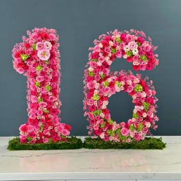 Floral number 16 made of pink and red roses