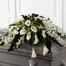 White calla lilyand orchid casket Spray