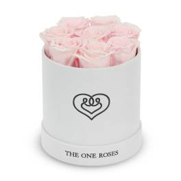 Pink roses arranged in a white round box with a heart logo