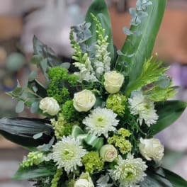 Tall white floral spray with roses and chrysanthemums